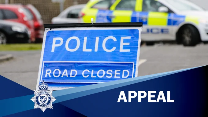 Police Road Closed' sign in road with police car in background with the caption 'APPEAL'.