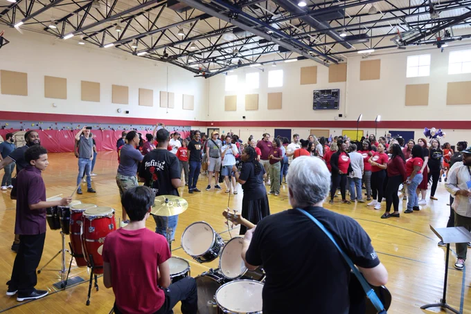 The Alice Deal Middle School staff and student go-go band performs in the gym as the pep rally begins.