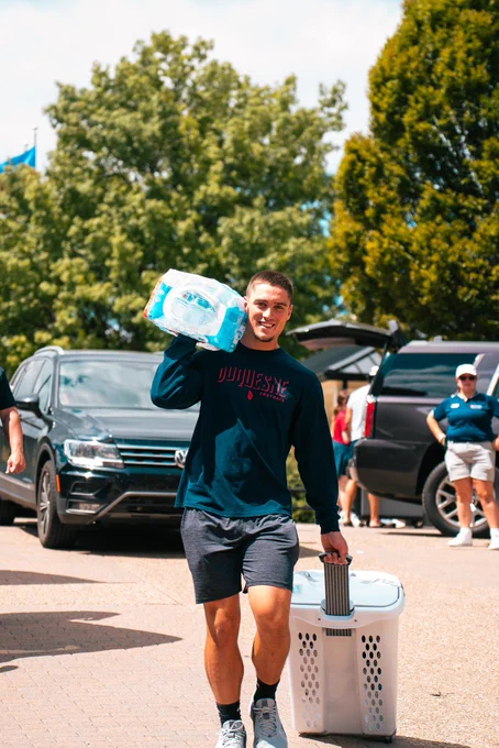 Carrying water and laundry basket