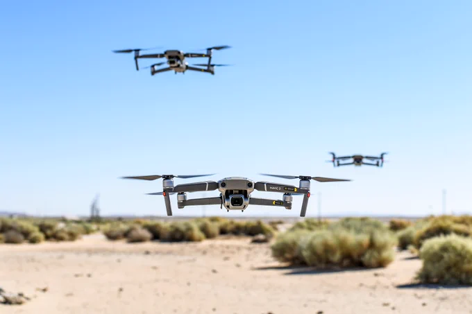Desert background and three drones flying, one in foreground and two in background. Each one has 4 propellers.

Drones at work. Defense and other life-and-death applications are only as reliable as their software. (Photo: Air Force Staff Sgt. Rachel Simones.)