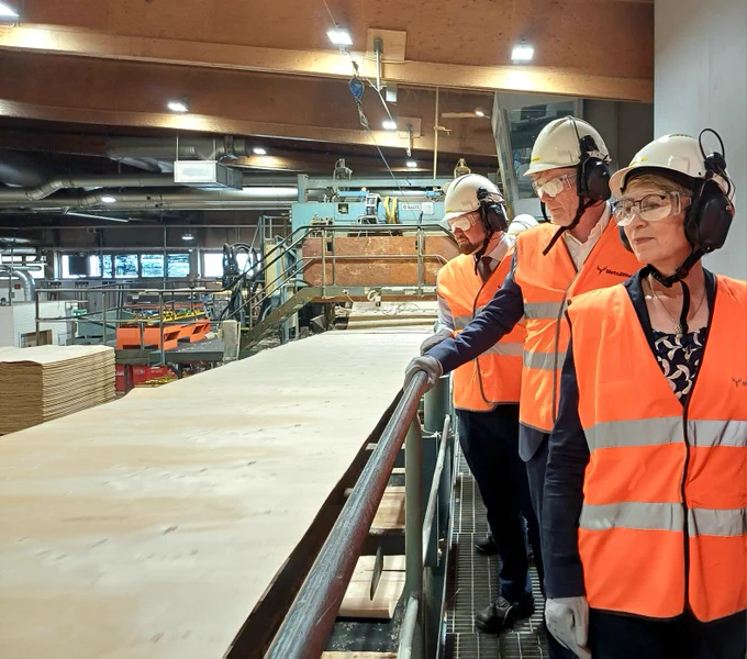 Ministers visiting a mill