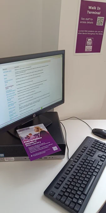 Library Walk In Service computer showing list of databases available 