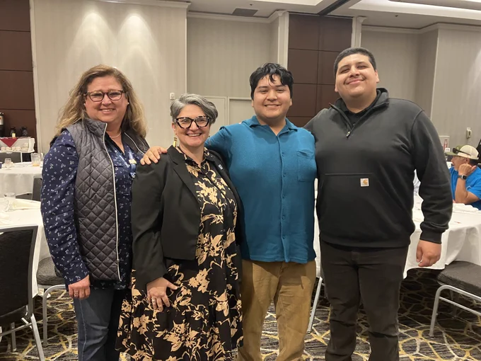 Image of AC Library staff and a teen volunteer