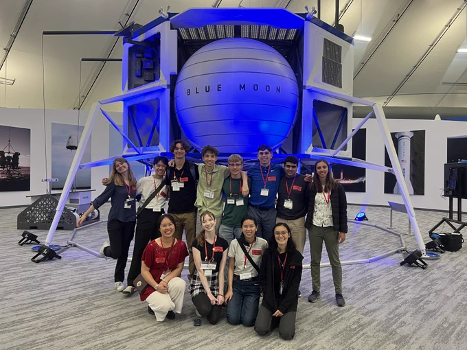 Red Team Group Photo in front of Blue Origin.