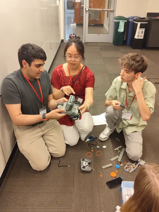 Two Scholars and SR-AF working tirelessly on the robotic challenge.