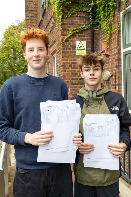 Photo of William Ellis GCSE students Anselm (left) and Orlando, who were among the highest achievers at the school.