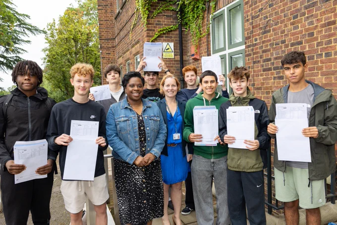 Photo of William Ellis GCSE students with Camden Cabinet Member, Cllr Sabrina Francis, and Headteacher Izzy Jones (centre).