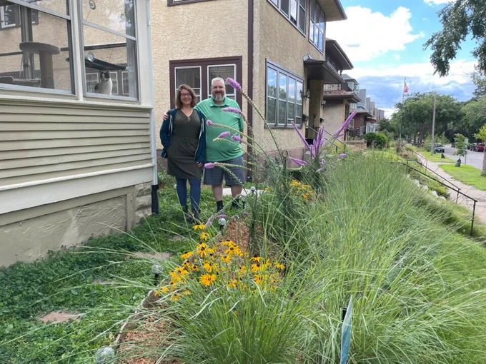 Mike and Jen alongside their rain garden