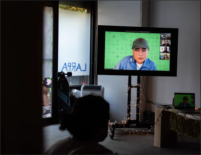 Photo of the TV inside LARPA where a zoom call is happening