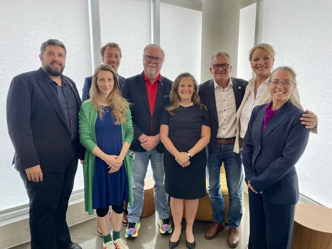 The Deputy Prime Minister standing with Montréal housing advocates.