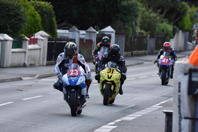 Not something you see everyday. 4 racers heading into Parliament Square in Ramsey. 