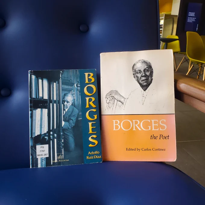 Two Books by Borges on a chair in the library café.