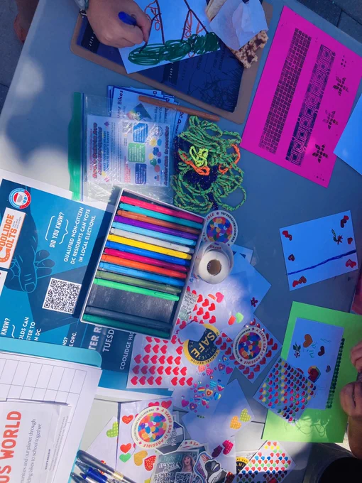 Stickers, art, markers and more at the kids advocacy table.