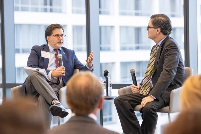 The dean of the law school leads a fireside chat