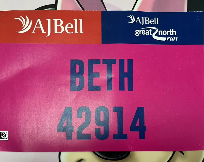 Pink race number for the AJ Bell Great North Run: Beth 42914