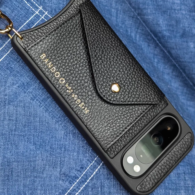 A Pixel 9 in a Bandolier phone case. 