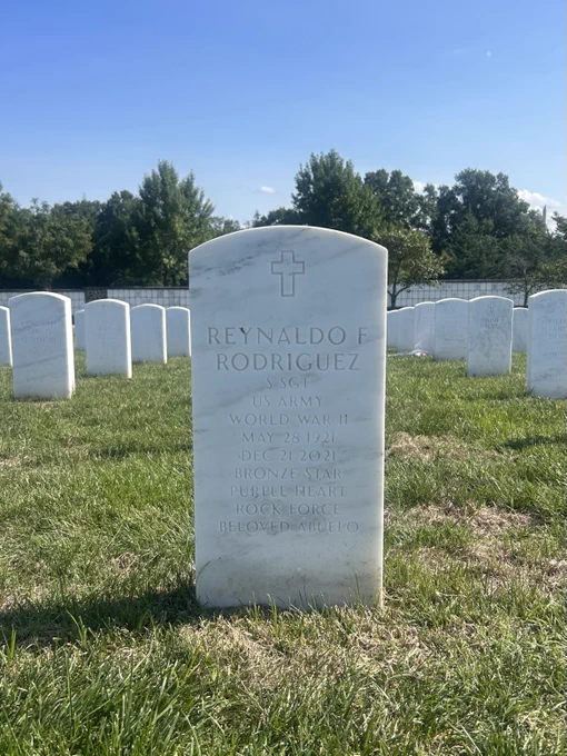Reynaldo F. Rodriguez's gravemarker reading "Rock Force Beloved Abuelo"