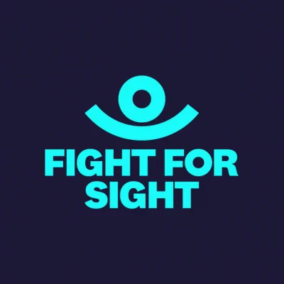 Fight for Sight logo. A circle symbolising an eye lid and a curved line denoting an eye lid underneath it. Fight for Sight is written below. 
