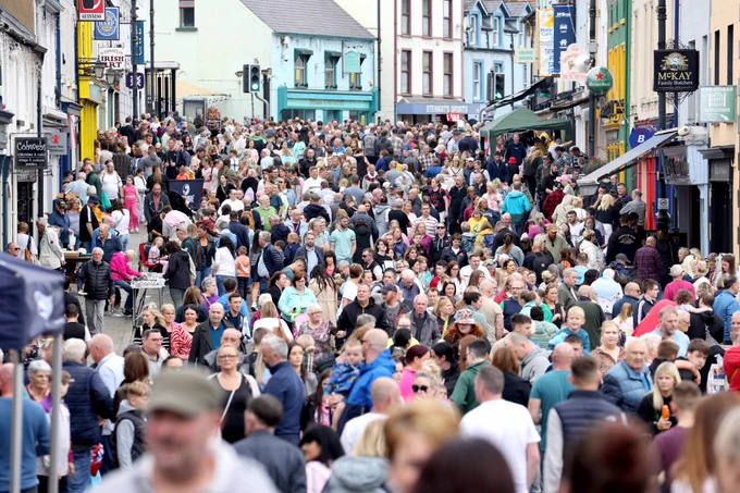 Thousands of people enjoying the festival atmosphere on Ann Street, with stalls lining the streets on Bank Holiday Monday 26th August.