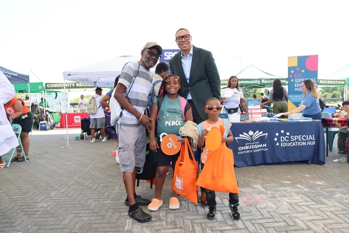 Chancellor Ferebee poses with a DCPS family.
