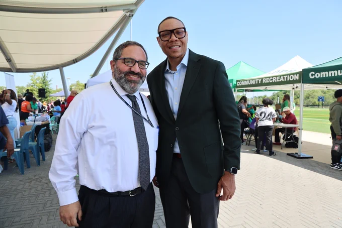 Chancellor Ferebee poses with Sam Abed, Director of the DC Department of Youth Rehabilitation Services (DYRS).