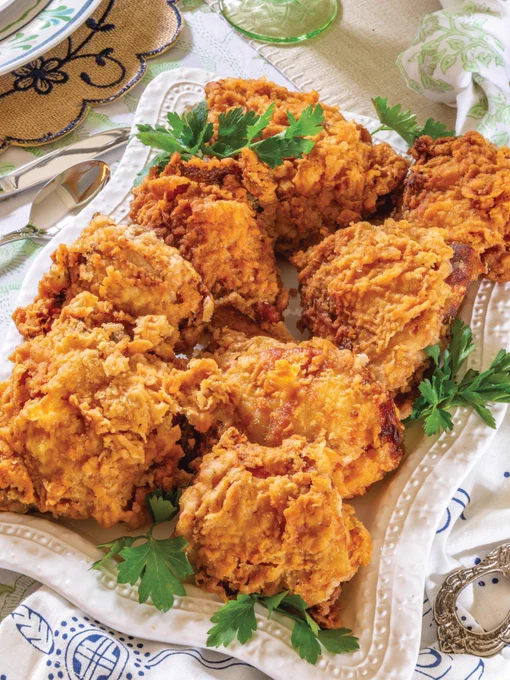 Fourth: Buttermilk Fried Chicken Thighs arranged on a platter.
