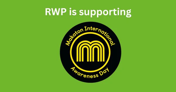 Image of circle black logo with yellow text - Makaton International Awareness Day