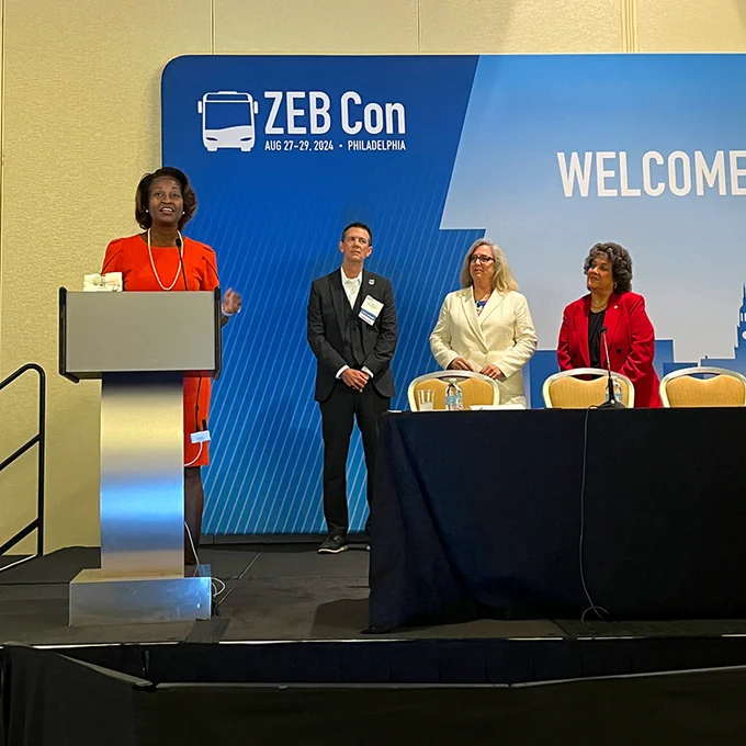 FTA Administrator Nuria Fernandez speaks at a podium at ZEB Con in Philadelphia, PA. 