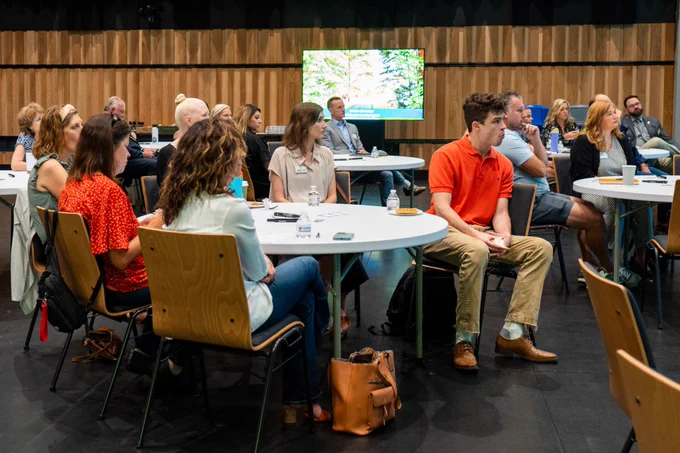 Group of people sitting at tables