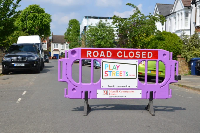 Image of an Ealing street with a purple road closed sign.