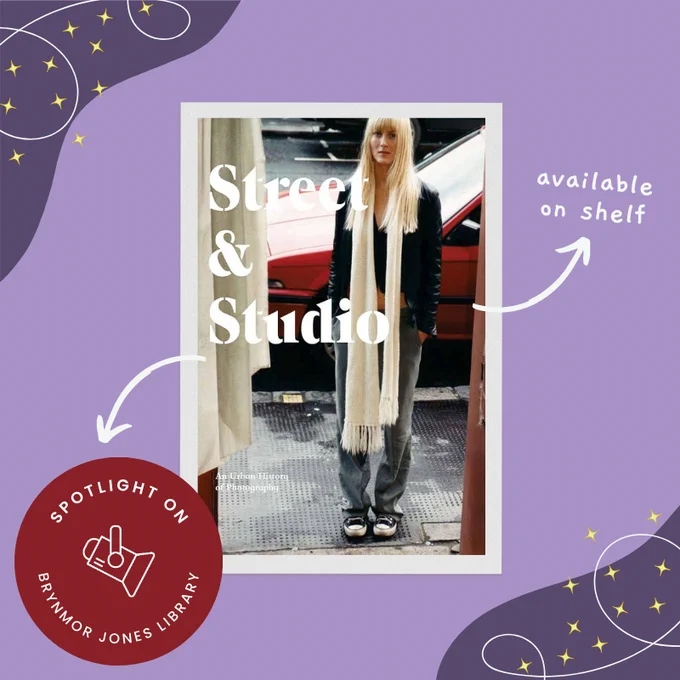 The book cover of 'Street & Studio: An Urban History of Photography' features a street photograph of a woman with long blonde hair. She is wearing baggy jeans with Converse shoes and a long scarf. It is displayed on a purple background with the Spotlight On logo in the bottom left corner.