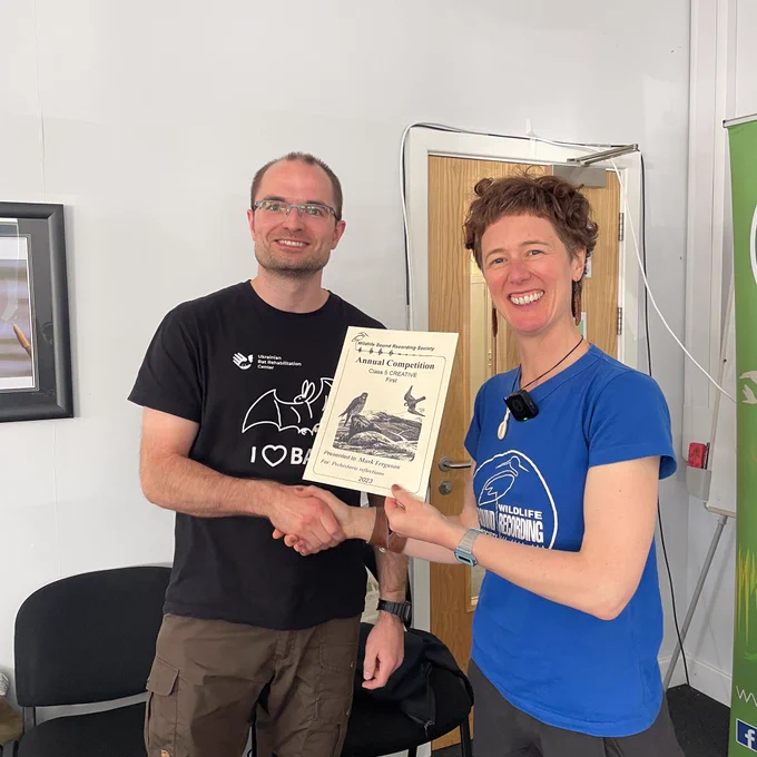 Mark Ferguson receives his award certificate from former WSRS Chair Helen Hedworth.