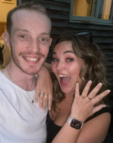 A very happy, lovely young couple and a rather old engagement ring.   
