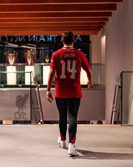 Federico Chiesa walking through the AXA Training Centre