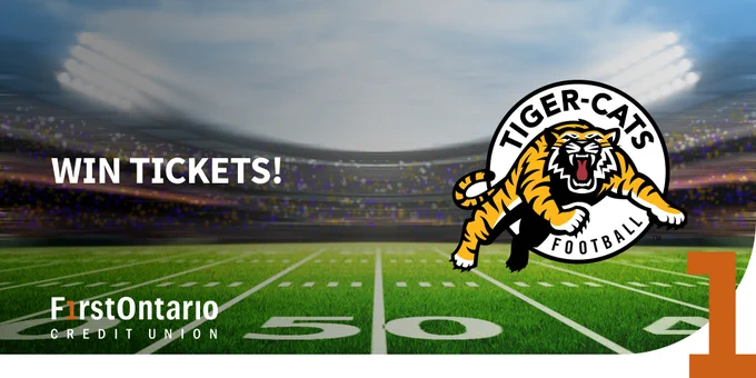 Promotional banner featuring "WIN TICKETS!"  and the logo of Tiger-Cats Football team, set against a backdrop of a football field and a stadium. The FirstOntario Credit Union logo is displayed in the bottom left corner.
