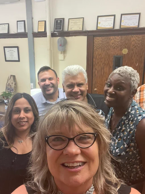 CDA Commissioner Jamie Rhee poses for a selfie with faculty.