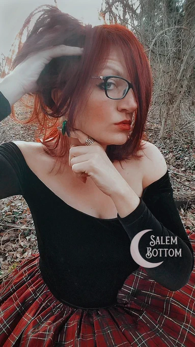  @SalemBottom's jewel bettle wing elytra earrings modeled by designer Sabrina Penguin