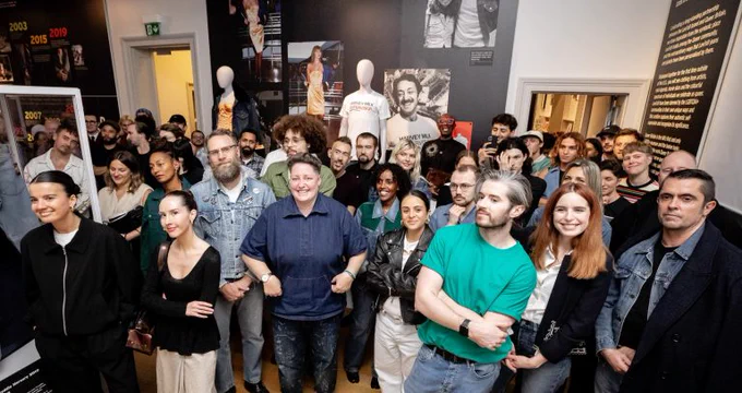 People at a launch event at Queer Britain