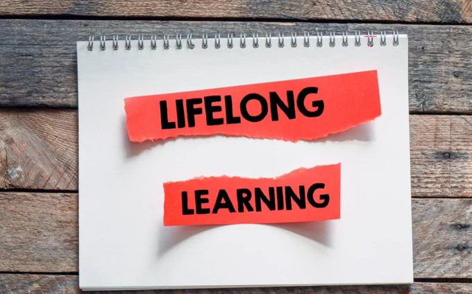 Lifelong learning notes on a notepad