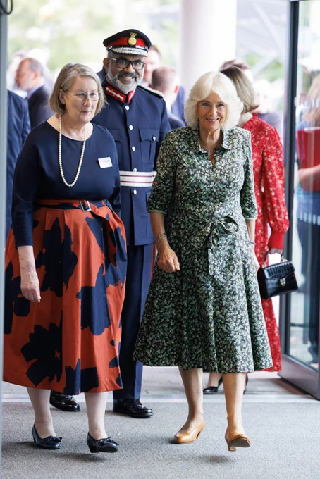 RUH Chair Alison Ryan walks with Her Majesty The Queen through the entrance to the Dyson Cancer Centre.
