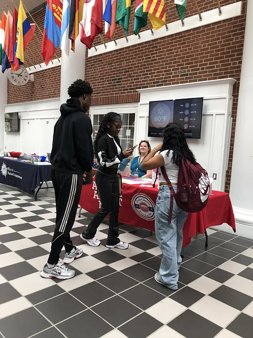people in Main Street on Bedford Campus