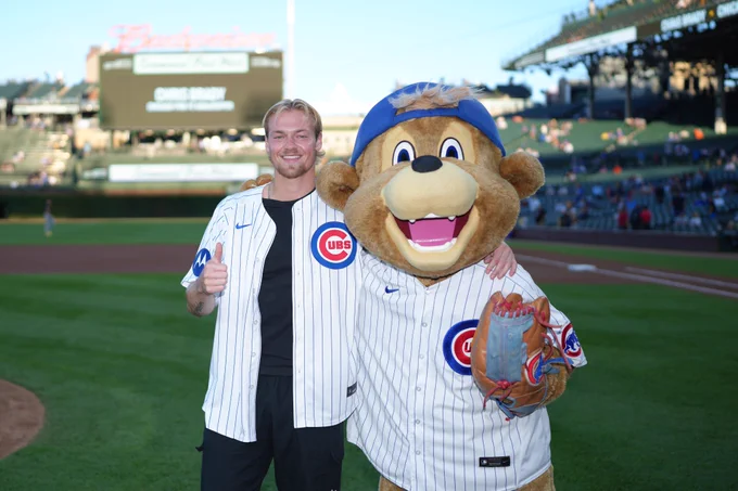 Chris Brady and Clark the Cub pose after a first pitch. (photo: Matt Dirksen/Cubs)