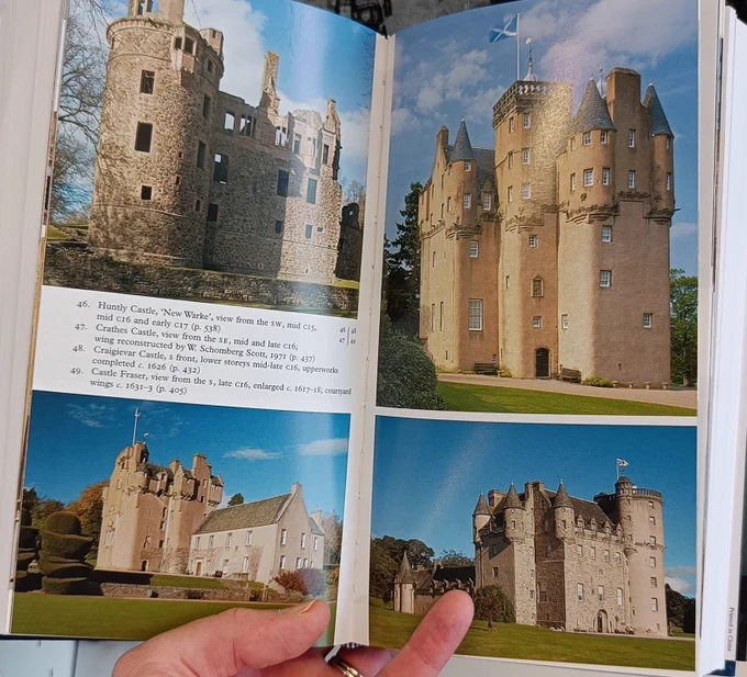 Photos of local castles in a book