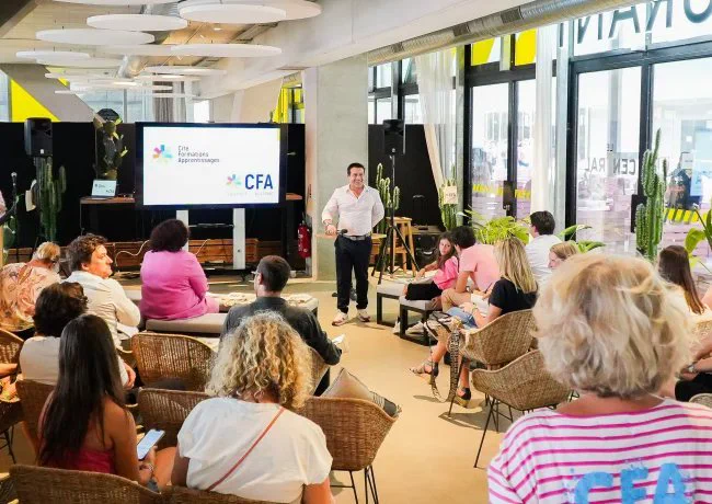 Photo de l'auditoire lors de la présentation de la CAF 