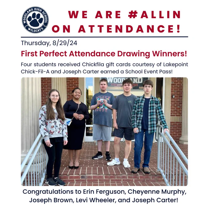 Image of five students standing on WHS front steps with their prizes