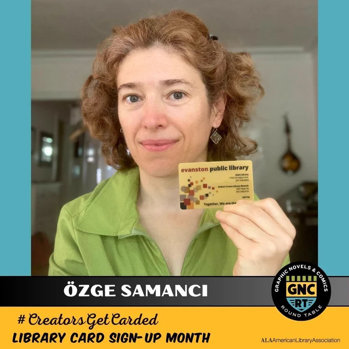 Comics creator Ozge Samanci holding her library card.
