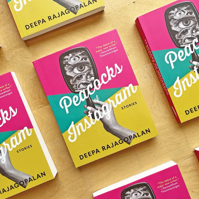 A photo of copies of Peacocks of Instagram laying side by side on a table, slightly askew.