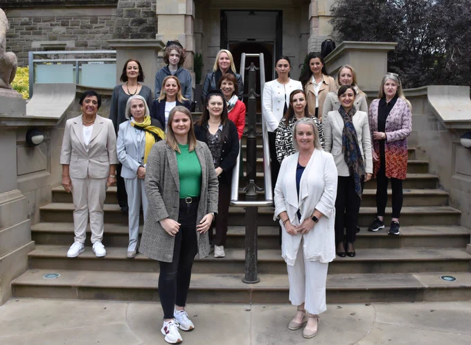 Image of a large group of people - Junior Ministers Aisling Reilly and Pam Cameron welcome members of the Cyprus Women Bi-Communal Coalition to Stormont Castle.