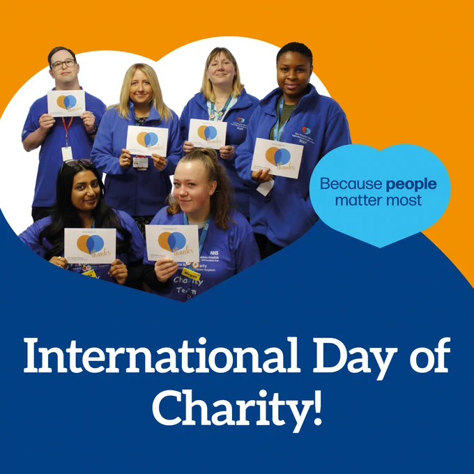 some members of the Charity team with text 'international day of charity!'