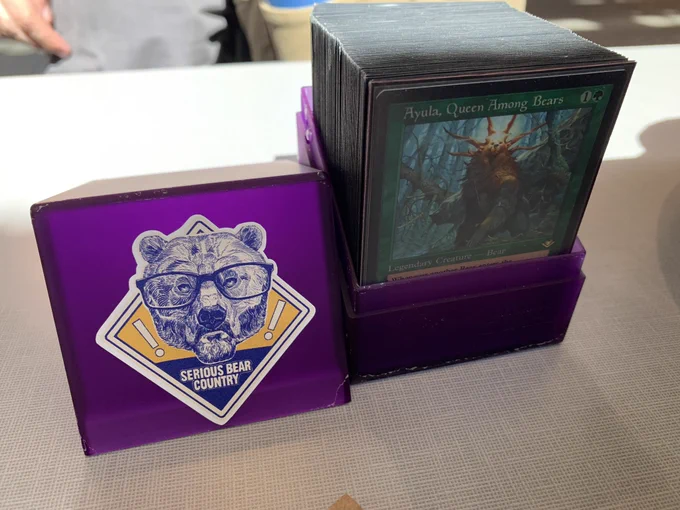 Bear-themed Deck of magic the gathering cards with a “serious bear country” sticker on the case